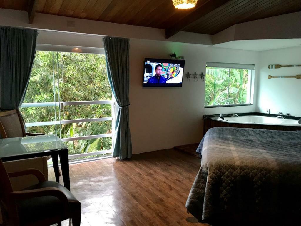 Suites Na Casa Da Praia — Photos 3